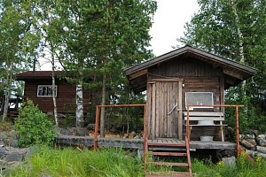 Дома Рускеалы в горах, "Изба на Острове" в горах - фото