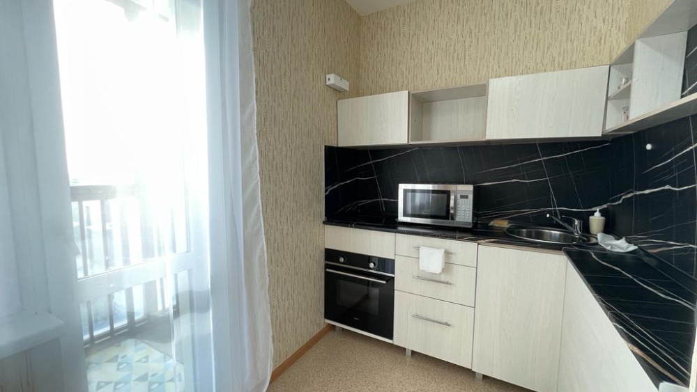 1-комнатная квартира имени Космонавта Поповича 18 в Южно-Сахалинске - фото 4