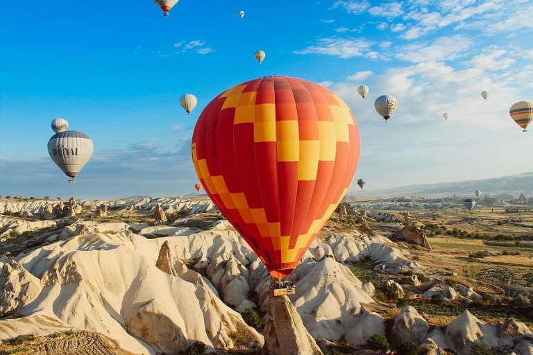 hot-air-balloons-rocks-cliffs-valleys.jpg